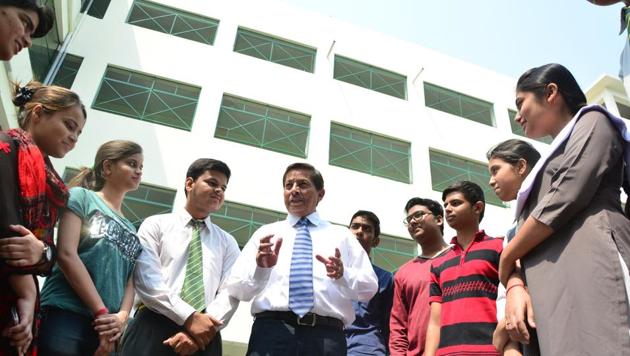 In Lucknow, several students turned up at their schools or went to religious places, while a few even took to reading books to de-stress themselves on the eve of the results. (In picture) Students of St Teresa’s Day School & College with their principal Peter Fanthome (centre). (Deepak Gupta/Hindustan Times) In Lucknow, several students turned up at their schools or went to religious places, while a few even took to reading books to de-stress themselves on the eve of the results. (In picture) Students of St Teresa’s Day School & College with their principal Peter Fanthome (centre). (Deepak Gupta/Hindustan Times)