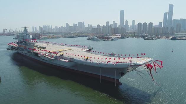 China's newly-built aircraft carrier Liaoning is transferred from dry dock into the water at a launch ceremony at a shipyard in Dalian. (AP File Photo) China's newly-built aircraft carrier Liaoning is transferred from dry dock into the water at a launch ceremony at a shipyard in Dalian. (AP File Photo)
