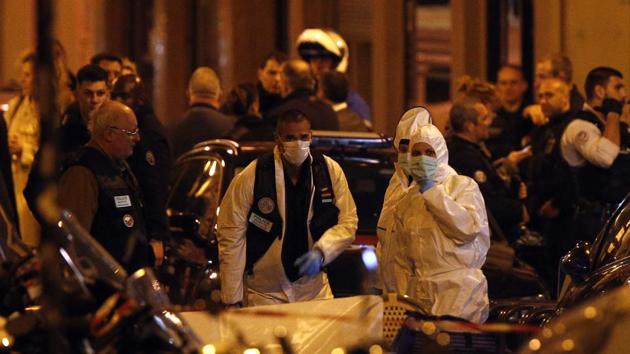 Scientific police officers investigate after a knife attack in central Paris, Saturday May 12, 2018. (AP Photo) Scientific police officers investigate after a knife attack in central Paris, Saturday May 12, 2018. (AP Photo)