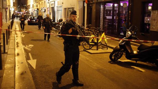 A police officer cordons off the area after a knife attack in central Paris, Saturday May 12, 2018. (AP) A police officer cordons off the area after a knife attack in central Paris, Saturday May 12, 2018. (AP)