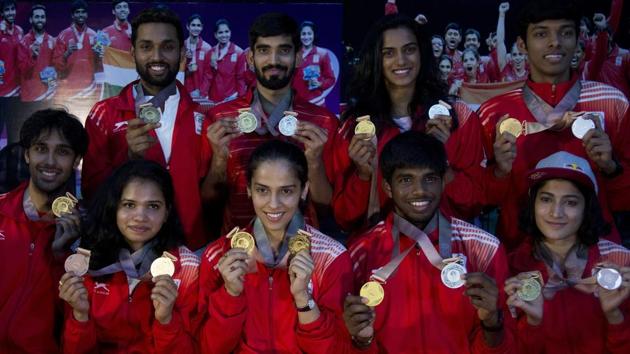 Indian badminton players from top left - H.S Prannoy, Kidambi Srikanth, P.V. Sindhu, Chirag Chandrashekhar Shetty, from bottom left, Pranaav Jerry Chopra, Sikki Reddy, Saina Nehwal, Satwiksairaj Rankireddy and Ashwin Ponnappa won medals during the 2018 Commonwealth Games.(AP)