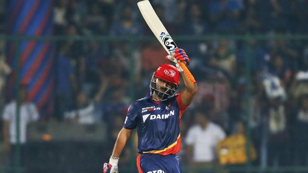 Rishabh Pant raises his bat after scoring fifty runs. (AP)