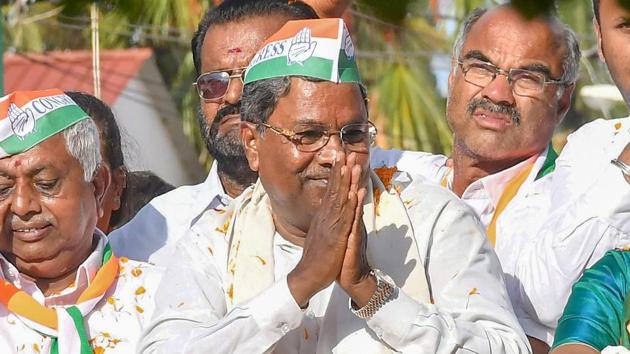 Karnataka chief minister Siddaramaiah during a roadshow ahead of Karnataka assembly elections in Chamundeshwari. (PTI File Photo) Karnataka chief minister Siddaramaiah during a roadshow ahead of Karnataka assembly elections in Chamundeshwari. (PTI File Photo)