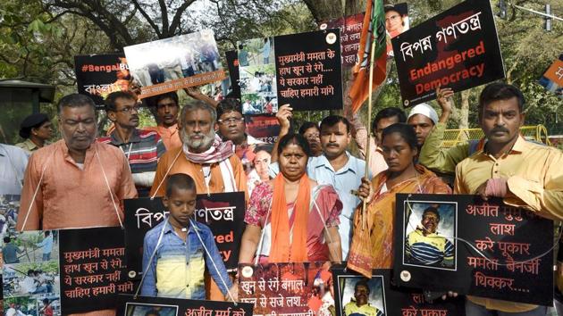 West Bengal BJP workers affected in pre-panchayat poll violence protest outside the residence of Union Home Minister Rajnath Singh in New Delhi. (PTI/FilePhoto) West Bengal BJP workers affected in pre-panchayat poll violence protest outside the residence of Union Home Minister Rajnath Singh in New Delhi. (PTI/FilePhoto)
