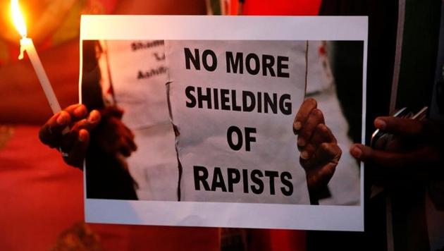File photo of protest against the rape of an eight-year-old girl in Kathua in Ahmedabad.(REUTERS)