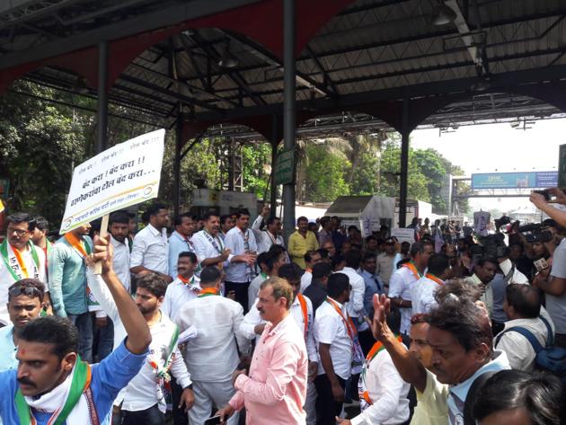 Local NCP workers started protesting at Anandnagar toll plaza in Mulund around 10am on Monday. They said they would continue the protest through the day. (Praful Gangurde) Local NCP workers started protesting at Anandnagar toll plaza in Mulund around 10am on Monday. They said they would continue the protest through the day. (Praful Gangurde)