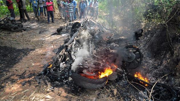 A vehicle set on fire after clashes between two political parties during Panchayat Poll at Shantipur in Nadia district of West Bengal. Ten people were killed and several injured during the panchayat elections as clashes broke out at several places between rival groups on Monday. There were also reports of ballot boxes being set on fire, vehicles burnt and poll officials attacked. (PTI) A vehicle set on fire after clashes between two political parties during Panchayat Poll at Shantipur in Nadia district of West Bengal. Ten people were killed and several injured during the panchayat elections as clashes broke out at several places between rival groups on Monday. There were also reports of ballot boxes being set on fire, vehicles burnt and poll officials attacked. (PTI)
