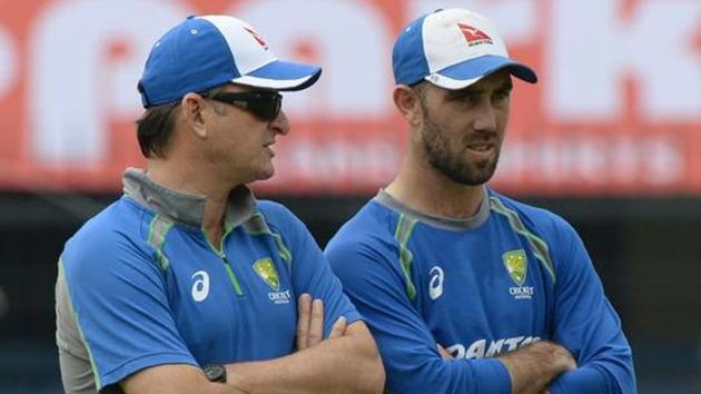 Australian cricketer Glenn Maxwell (R) speaks with team selector Mark Waugh during a training session at the Holkar Stadium in Indore on September 23, 2017. Waugh will not be renewing his contract as an Australian selector.(AFP)