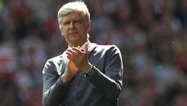 Arsenal's French manager Arsene Wenger gestures during the English Premier League match between Huddersfield Town and Arsenal at the John Smith's stadium in Huddersfield, England on May 13, 2018.(AFP)