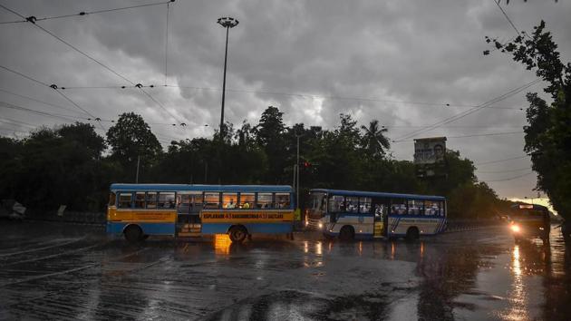 Vehicles ply at a road as visibility turns poor during heavy rains in Kolkata on Sunday. According to the state disaster management department, Sunday’s toll took the total number of storm-related deaths in West Bengal to 46 since April 30. Chief minister Mamata Banerjee said her government will provide compensation to the families of the dead and help rebuild storm-ravaged houses. (Ashok Bhaumik / PTI) Vehicles ply at a road as visibility turns poor during heavy rains in Kolkata on Sunday. According to the state disaster management department, Sunday’s toll took the total number of storm-related deaths in West Bengal to 46 since April 30. Chief minister Mamata Banerjee said her government will provide compensation to the families of the dead and help rebuild storm-ravaged houses. (Ashok Bhaumik / PTI)