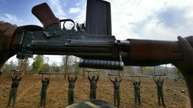 Maoist rebels raise their arms during an exercise at a temporary base in the Abujh Marh forests, in Chhattisgarh. Seven Maoists, including two women, were killed in two encounters in Odisha’s Kandhamal and Bolangir districts since Saturday night, with the director general of police RP Sharma calling it a “red letter day”. While four bodies were recovered on Sunday night, one more was recovered the next morning. (Mustafa Quraishi / AP File) Maoist rebels raise their arms during an exercise at a temporary base in the Abujh Marh forests, in Chhattisgarh. Seven Maoists, including two women, were killed in two encounters in Odisha’s Kandhamal and Bolangir districts since Saturday night, with the director general of police RP Sharma calling it a “red letter day”. While four bodies were recovered on Sunday night, one more was recovered the next morning. (Mustafa Quraishi / AP File)