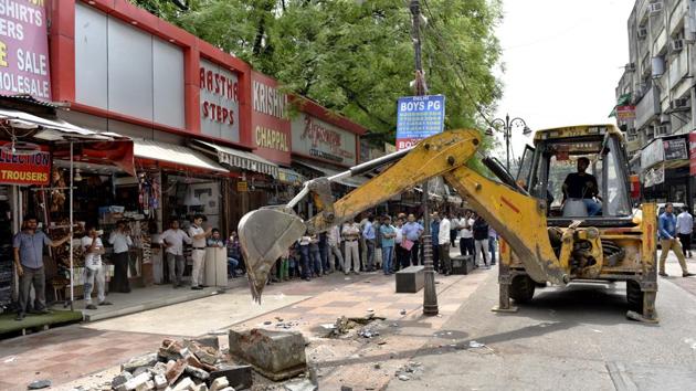 Municipal Corporation of Delhi (MCD) officials today, carried out demolitions against encroachments during an anti-encroachment drive at Karol Bagh in New Delhi. (Sanchit Khanna / HT Photo) Municipal Corporation of Delhi (MCD) officials today, carried out demolitions against encroachments during an anti-encroachment drive at Karol Bagh in New Delhi. (Sanchit Khanna / HT Photo)