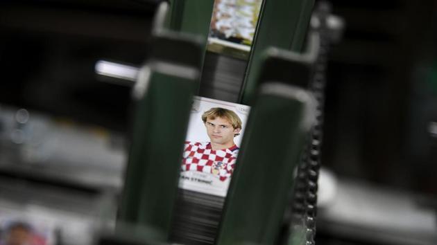 A card featuring Croatia’s defender Ivan Strinic for the 2018 Russia football World Cup. Despite other partnership deals, notably with Disney, and inroads into cycling and basketball, football still represents the largest part of Panini’s business. (Marco Bertorello / AFP) A card featuring Croatia’s defender Ivan Strinic for the 2018 Russia football World Cup. Despite other partnership deals, notably with Disney, and inroads into cycling and basketball, football still represents the largest part of Panini’s business. (Marco Bertorello / AFP)