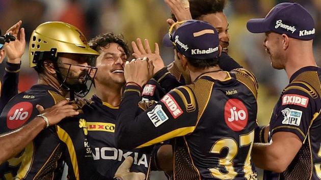 Kolkata Knight Riders bowler Kuldeep Yadav celebrates with teammates after the dismissal of Rajasthan Royals' Ben Stokes(unseen) during their IPL 2018 match in Kolkata on Tuesday.(PTI)