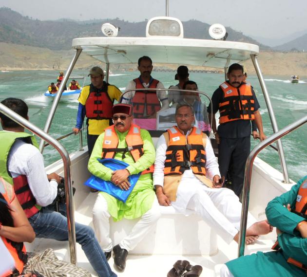 Uttarakhand chief minister TS Rawat along with state tourism minister Satpal Maharaj at the Tehri Lake on Wednesday.(HT Photo.) Uttarakhand chief minister TS Rawat along with state tourism minister Satpal Maharaj at the Tehri Lake on Wednesday.(HT Photo.)