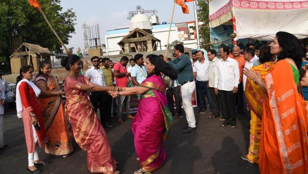 Party workers celebrating success of the early poll numbers at Dr Babasaheb Ambedkar chowk, Pimpri, on Sunday.(HT PHOTO) Party workers celebrating success of the early poll numbers at Dr Babasaheb Ambedkar chowk, Pimpri, on Sunday.(HT PHOTO)
