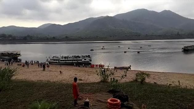 Rescuers on rafts search in the Godavari River after a ferry capsized in heavy winds on Tuesday in Devipatnam, Andhra Pradesh. (AP Photo) Rescuers on rafts search in the Godavari River after a ferry capsized in heavy winds on Tuesday in Devipatnam, Andhra Pradesh. (AP Photo)
