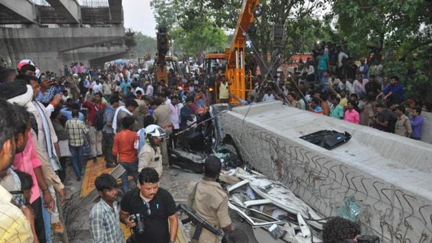 Police and rescue personnel gather at the scene of a flyover collapse in Varanasi on Tuesday.(Rajesh Kumar / HT Photo) Police and rescue personnel gather at the scene of a flyover collapse in Varanasi on Tuesday.(Rajesh Kumar / HT Photo)