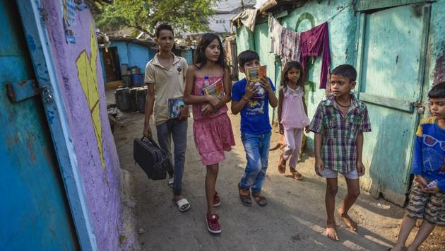 This batch of students is aged between six to fourteen years. They are all residents of Sanjay Camp, a settlement comprising hundreds of families, many of whom are unskilled workers in Delhi’s Chanakyapuri embassy enclave. (Burhaan Kinu / HT Photo)