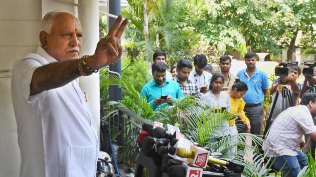 BS Yeddyurappa shows a victory sign during a press conference a day after polling for the Karnataka Assembly elections.(PTI Photo) BS Yeddyurappa shows a victory sign during a press conference a day after polling for the Karnataka Assembly elections.(PTI Photo)