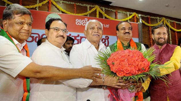 Union ministers and Bharatiya Janata Party leaders Prakash Javadekar (right), Ananth Kumar and JP Nadda greet Karnataka unit chief of the party BS Yeddyurappa, after he was elected leader of the BJP legislature party, in Bengaluru, on Wednesday.(PTI photo)