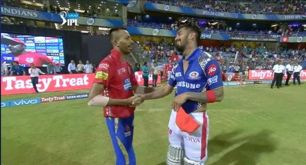 Kings XI Punjab’s KL Rahul and Mumbai Indians’ Hardik Pandya swap jerseys after their Indian Premier League (IPL) 2018 match.(IPL)