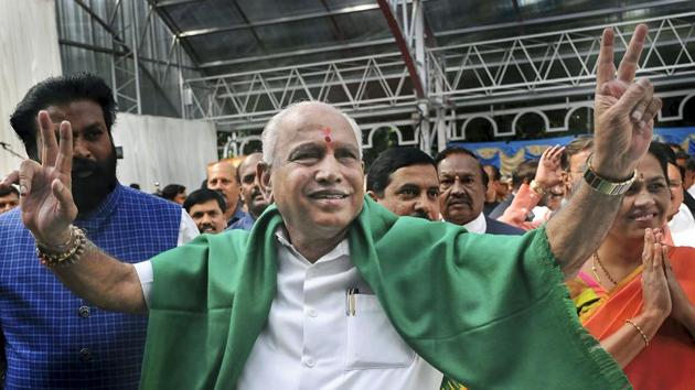 Bharatiya Janata Party (BJP) leader BS Yeddyurappa flashes the victory sign as he arrives at Governor's House to take oath as Chief Minister of Karnataka state, in Bengaluru, on Thursday. (PTI Photo) Bharatiya Janata Party (BJP) leader BS Yeddyurappa flashes the victory sign as he arrives at Governor's House to take oath as Chief Minister of Karnataka state, in Bengaluru, on Thursday. (PTI Photo)