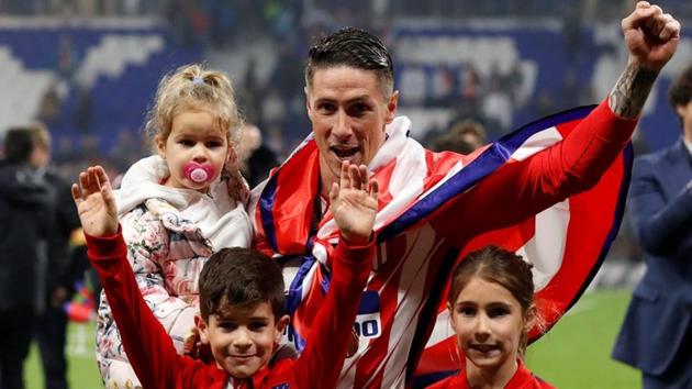 Atletico Madrid boyhood fan Fernando Torres finally ended his long wait for a trophy with the club. (REUTERS)