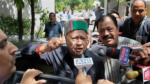 Police have registered a case against former Himachal Pradesh chief minister Virbhadra Singh and his son, Vikramaditya Singh, for allegedly breaking into a historical structure belonging to a relative over a family dispute. A few others, including former public works department engineer-in-chief Swami Prakash Negi, were also charged with helping the duo trespass into the Padam Palace at Rampur. (PTI File) Police have registered a case against former Himachal Pradesh chief minister Virbhadra Singh and his son, Vikramaditya Singh, for allegedly breaking into a historical structure belonging to a relative over a family dispute. A few others, including former public works department engineer-in-chief Swami Prakash Negi, were also charged with helping the duo trespass into the Padam Palace at Rampur. (PTI File)