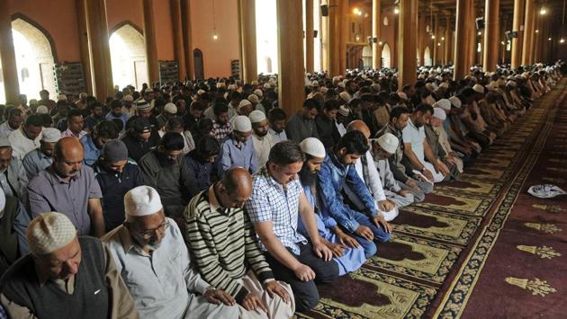 People offer prayers during the first day of fasting month of Ramzan inside Kashmir's Jamia Masjid in Srinagar on Thursday. (Waseem Andrabi / HT Photo) People offer prayers during the first day of fasting month of Ramzan inside Kashmir's Jamia Masjid in Srinagar on Thursday. (Waseem Andrabi / HT Photo)