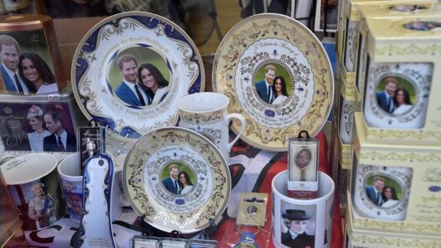 Plates, mugs and spoons are just the beginning of themed souvenirs doing the rounds for the forthcoming royal wedding. With growth shrinking and the government riven over Brexit, Saturday’s wedding is set to provide a national boost and give people an excuse to party. (Toby Melville / Reuters)