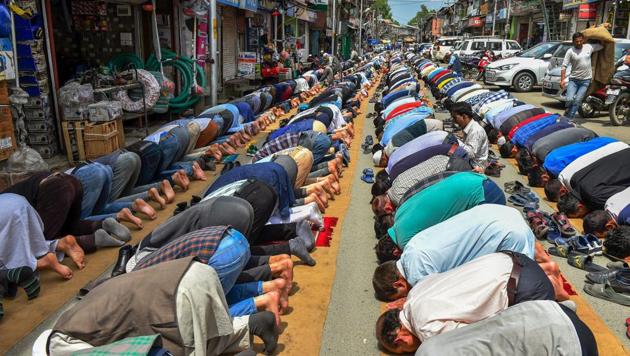 Muslims offer prayers on the first day of Ramadan at Budshah Chowk, in Srinagar, on Thursday. (PTI Photo) Muslims offer prayers on the first day of Ramadan at Budshah Chowk, in Srinagar, on Thursday. (PTI Photo)