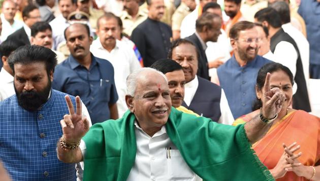 BJP leader B S Yeddyurappa flashes the victory sign as he arrives at Governor’s House to take oath as Chief Minister of Karnataka state, in Bengaluru, on Thursday. (Arijit Sen/HT Photo) BJP leader B S Yeddyurappa flashes the victory sign as he arrives at Governor’s House to take oath as Chief Minister of Karnataka state, in Bengaluru, on Thursday. (Arijit Sen/HT Photo)