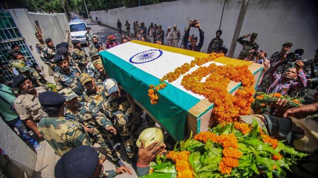 Border Security Force (BSF) personnel carry the coffin of soldier Sita Ram Upadhyaya who was killed in firing by Pakistan Rangers along the International Border. at the BSF headquarters in Jammu on Friday. Jammu and Kashmir chief minister Mehbooba Mufti hit out at Pakistan for violating ceasefire in the region, saying Islamabad has shown no respect for Ramzan. (PTI) Border Security Force (BSF) personnel carry the coffin of soldier Sita Ram Upadhyaya who was killed in firing by Pakistan Rangers along the International Border. at the BSF headquarters in Jammu on Friday. Jammu and Kashmir chief minister Mehbooba Mufti hit out at Pakistan for violating ceasefire in the region, saying Islamabad has shown no respect for Ramzan. (PTI)
