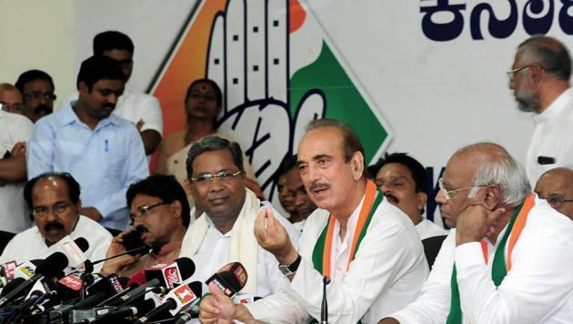 Congress senior leader Ghulam Nabi Azad speaks as Mallikarjun Kharge and former Karnataka chief minister Siddaramaiah looks on, during a press conference after the Supreme Court order of floor test for newly sworn-in chief minister BS Yeddyurappa. (PTI) Congress senior leader Ghulam Nabi Azad speaks as Mallikarjun Kharge and former Karnataka chief minister Siddaramaiah looks on, during a press conference after the Supreme Court order of floor test for newly sworn-in chief minister BS Yeddyurappa. (PTI)