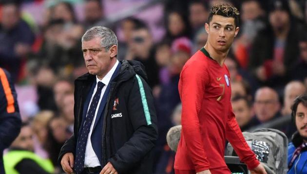 Cristiano Ronaldo (R) walks past Portugal's coach Fernando Santos as he leaves the pitch during the international friendly football match between Portugal and Netherlands at Stade de Geneve stadium in Geneva on March 26, 2018.(AFP) Cristiano Ronaldo (R) walks past Portugal's coach Fernando Santos as he leaves the pitch during the international friendly football match between Portugal and Netherlands at Stade de Geneve stadium in Geneva on March 26, 2018.(AFP)