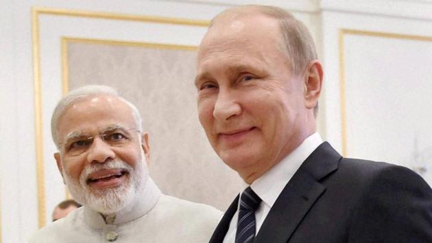 Prime Minister Narendra Modi shakes hands with Russian President Vladimir Putin during a bilateral meeting in Tashkent.(PTI FIle Photo)