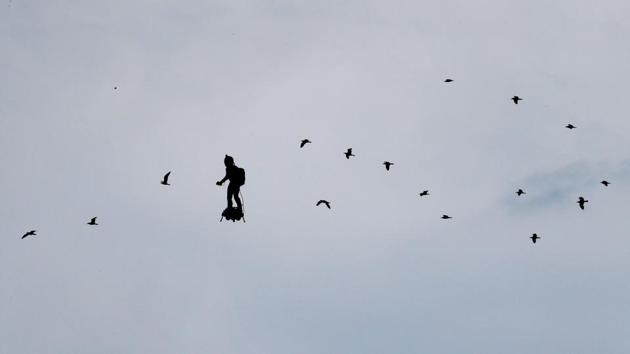 Zapata CEO Franky Zapata flies a jet-powered hoverboard or “Flyboard” above the Croisette and the Mediterranean sea during the 71st edition of the Cannes Film Festival. (Eric Gaillard / REUTERS) Zapata CEO Franky Zapata flies a jet-powered hoverboard or “Flyboard” above the Croisette and the Mediterranean sea during the 71st edition of the Cannes Film Festival. (Eric Gaillard / REUTERS)