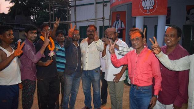 BJP workers celebrating in Jhargram after the panchayat results on Thursday.(HT Photo)