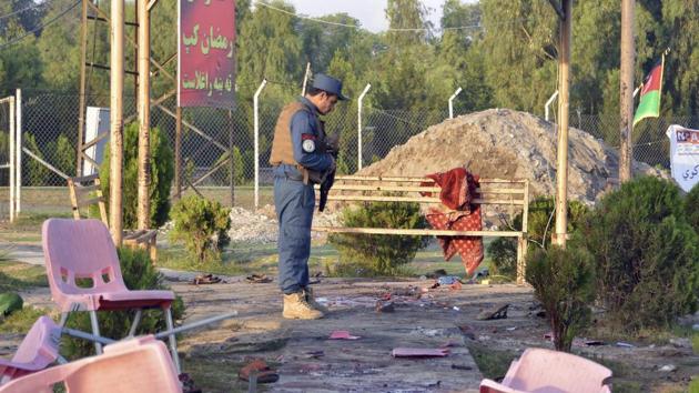 A policeman inspects the site of a bomb attack at a cricket stadium in Jalalabad city, capital of eastern Nangarhar province, Afghanistan, Saturday, May 19, 2018. (AP) A policeman inspects the site of a bomb attack at a cricket stadium in Jalalabad city, capital of eastern Nangarhar province, Afghanistan, Saturday, May 19, 2018. (AP)