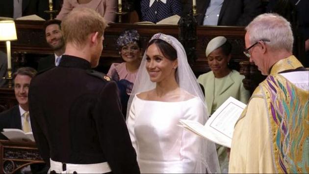 In this frame from video, Britain's Prince Harry and Meghan Markle exchange vows during their wedding ceremony at St. George's Chapel in Windsor Castle in Windsor, near London, May 19. Even the vows the couple exchanged were different from what they had been when Diana married Charles.(AP)