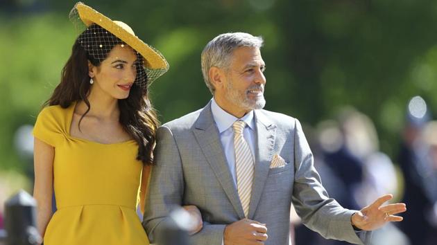Amal Clooney and George Clooney arrive for the wedding ceremony. (Gareth Fuller / Pool via AP) Amal Clooney and George Clooney arrive for the wedding ceremony. (Gareth Fuller / Pool via AP)
