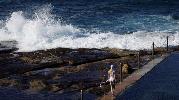 A model presents creation by Emilia Wickstead for Matchesfashion.com during the Australian Fashion Week at Wylie's Baths in Coogee, East Sydney, Australia. (Edgar Su / REUTERS) A model presents creation by Emilia Wickstead for Matchesfashion.com during the Australian Fashion Week at Wylie's Baths in Coogee, East Sydney, Australia. (Edgar Su / REUTERS)