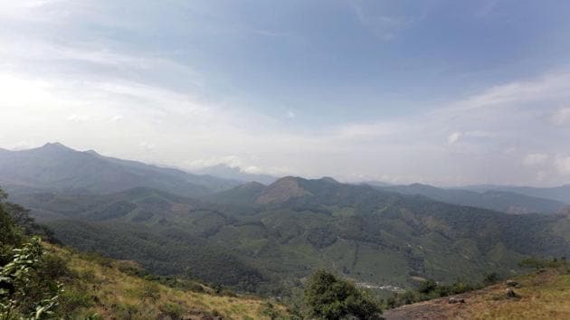 A panoramic view from the Eravikulam National Park. Kerala’s misty getaway Munnar, 1600 m above sea level in Idukki district, is preparing for nature’s wonder --the Neelakurinji (strobilanthes kunthiana) blooming season. with a clock like precision. Scattered blooming has begun, and the coming months will turn the hills into a sea of blue. (Vivek Nair / HT Photo) A panoramic view from the Eravikulam National Park. Kerala’s misty getaway Munnar, 1600 m above sea level in Idukki district, is preparing for nature’s wonder --the Neelakurinji (strobilanthes kunthiana) blooming season. with a clock like precision. Scattered blooming has begun, and the coming months will turn the hills into a sea of blue. (Vivek Nair / HT Photo)