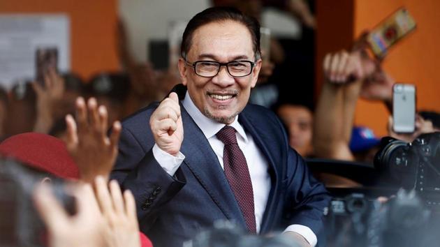 Malaysian politician Anwar Ibrahim gestures as he leaves a hospital where he is receiving treatment, ahead of an audience with Malaysia's King, in Kuala Lumpur, Malaysia. Ibrahim received a full pardon against charges of corruption and sodomy as promised by newly elected Prime Minister Mahathir Mohamad. (Lai Seng Sin / REUTERS) Malaysian politician Anwar Ibrahim gestures as he leaves a hospital where he is receiving treatment, ahead of an audience with Malaysia's King, in Kuala Lumpur, Malaysia. Ibrahim received a full pardon against charges of corruption and sodomy as promised by newly elected Prime Minister Mahathir Mohamad. (Lai Seng Sin / REUTERS)