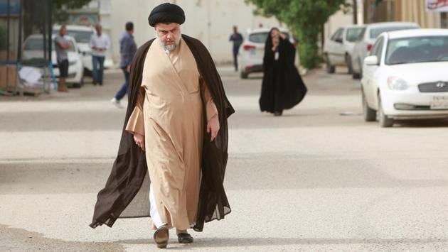 Iraqi Shi'ite cleric Moqtada al-Sadr attends to cast his vote at a polling station during the parliamentary election in Najaf, Iraq. Sadr’s Saeroun bloc won a majority in the elections, pegging him at the front of negotiations for the next government. (Alaa al-Marjani / REUTERS) Iraqi Shi'ite cleric Moqtada al-Sadr attends to cast his vote at a polling station during the parliamentary election in Najaf, Iraq. Sadr’s Saeroun bloc won a majority in the elections, pegging him at the front of negotiations for the next government. (Alaa al-Marjani / REUTERS)