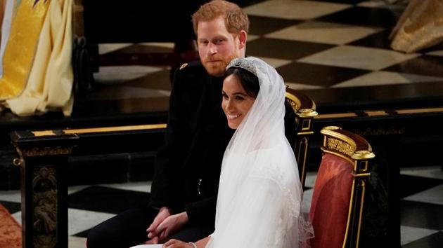 Prince Harry and Meghan Markle in St George's Chapel at Windsor Castle during their wedding service in Windsor. The royal couple have now officially wed. (Owen Humphreys / Pool / REUTERS)