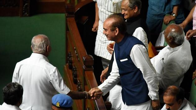 Congress leader Ghulam Nabi Azad shakes hand with BS Yeddyurappa after he resigned as the chief minister of Karnataka during a special session at Vidhan Soudha in Bengaluru on May 19.(Arijit Sen/HT Photo) Congress leader Ghulam Nabi Azad shakes hand with BS Yeddyurappa after he resigned as the chief minister of Karnataka during a special session at Vidhan Soudha in Bengaluru on May 19.(Arijit Sen/HT Photo)