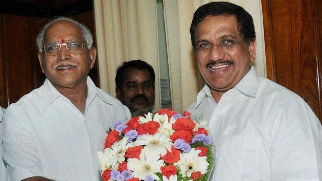 Karnataka Chief Minister B S Yeddyurappa (left) is greeted by pro-tem speaker KG Bopaiah in Bengaluru on Thursday.(PTI)