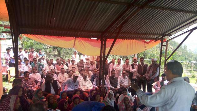 A meeting of Congress workers in Tharali, where bypoll was necessitated following death of MLA Magan Lal Shah. (HT Photo) A meeting of Congress workers in Tharali, where bypoll was necessitated following death of MLA Magan Lal Shah. (HT Photo)